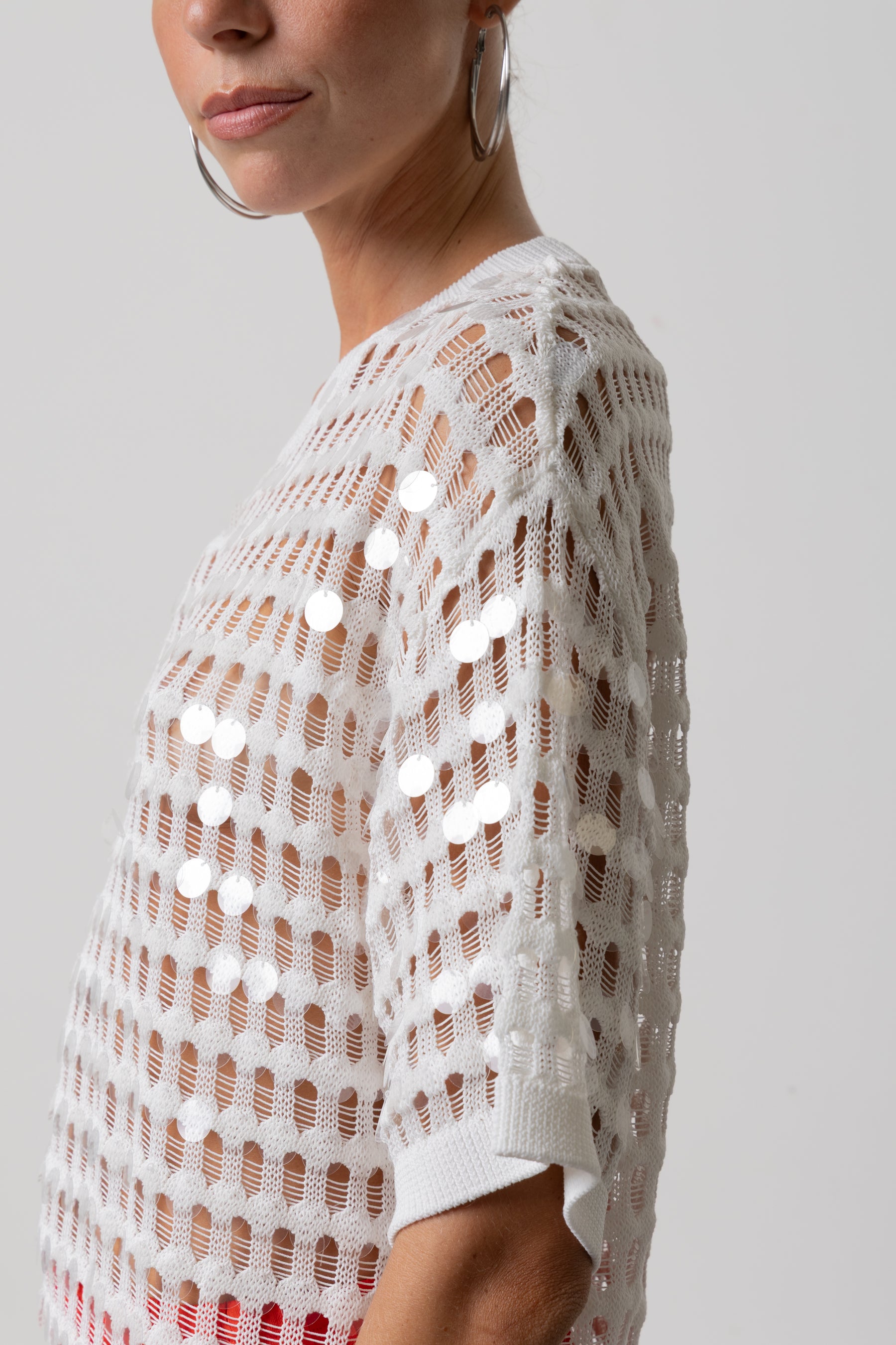 Maglia traforata con paillettes Icona