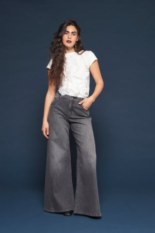 Jeans wide leg nero délavé con borchie Kaos Denim