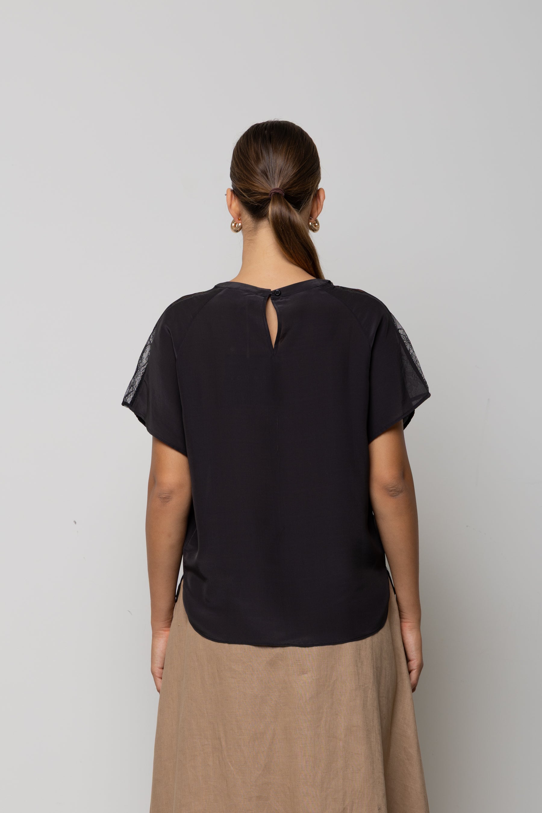 Blusa con inserti in pizzo Icona