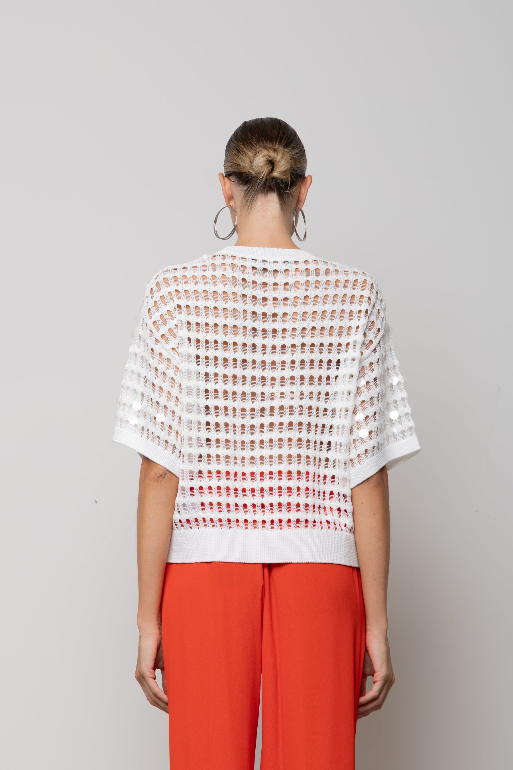 Maglia traforata con paillettes Icona