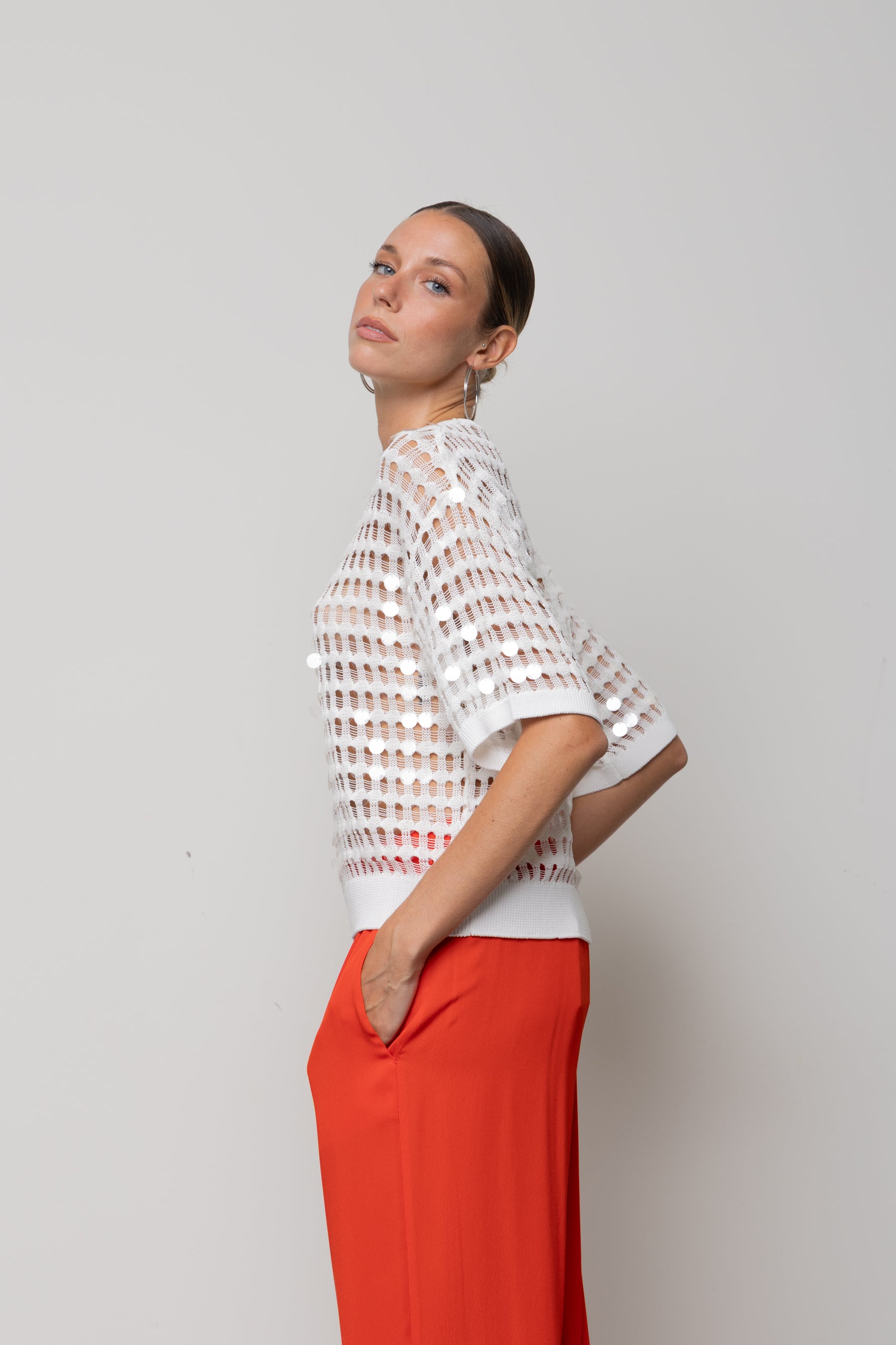 Maglia traforata con paillettes Icona