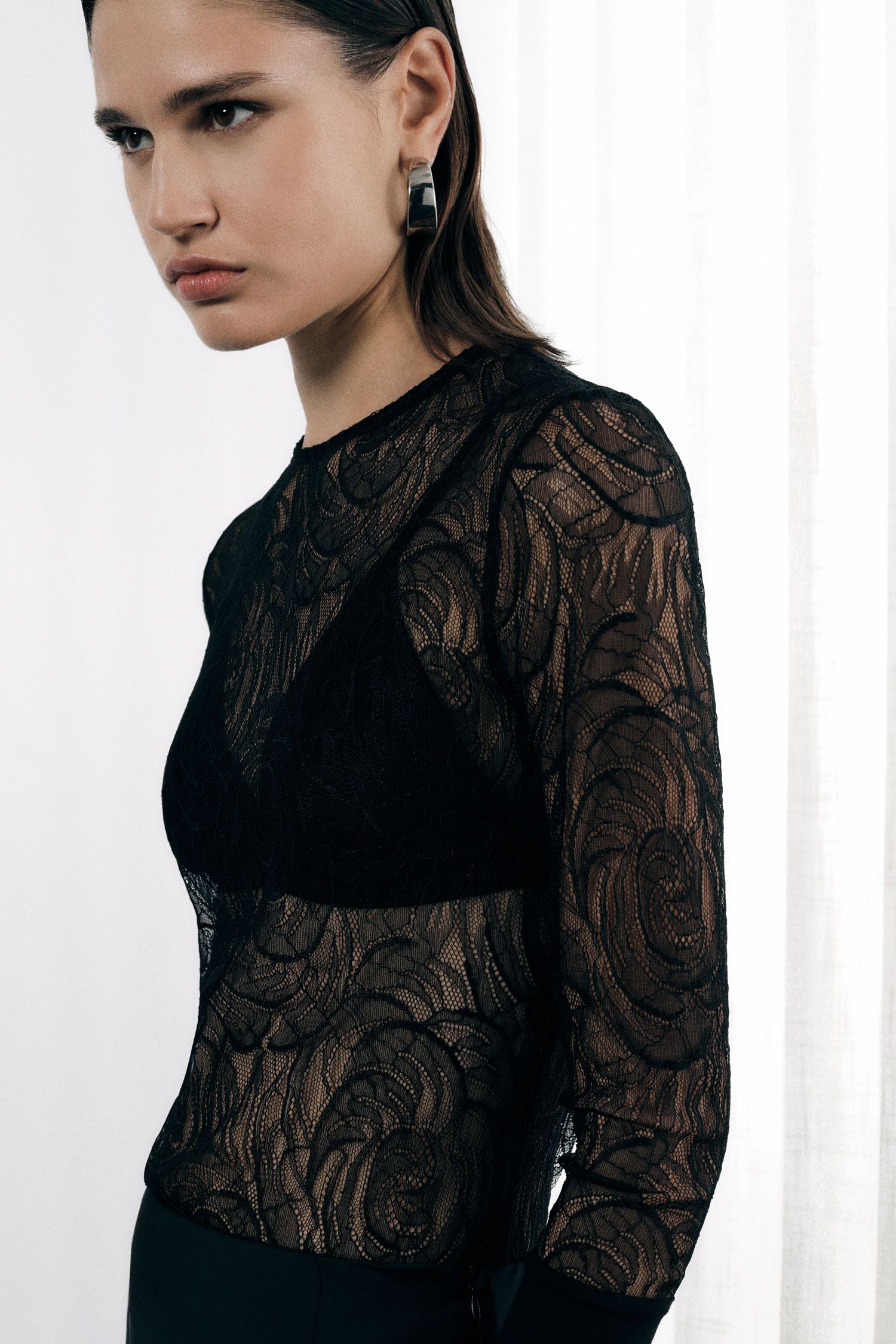 Top a maniche lunghe trasparente motivo ricamo Imperial