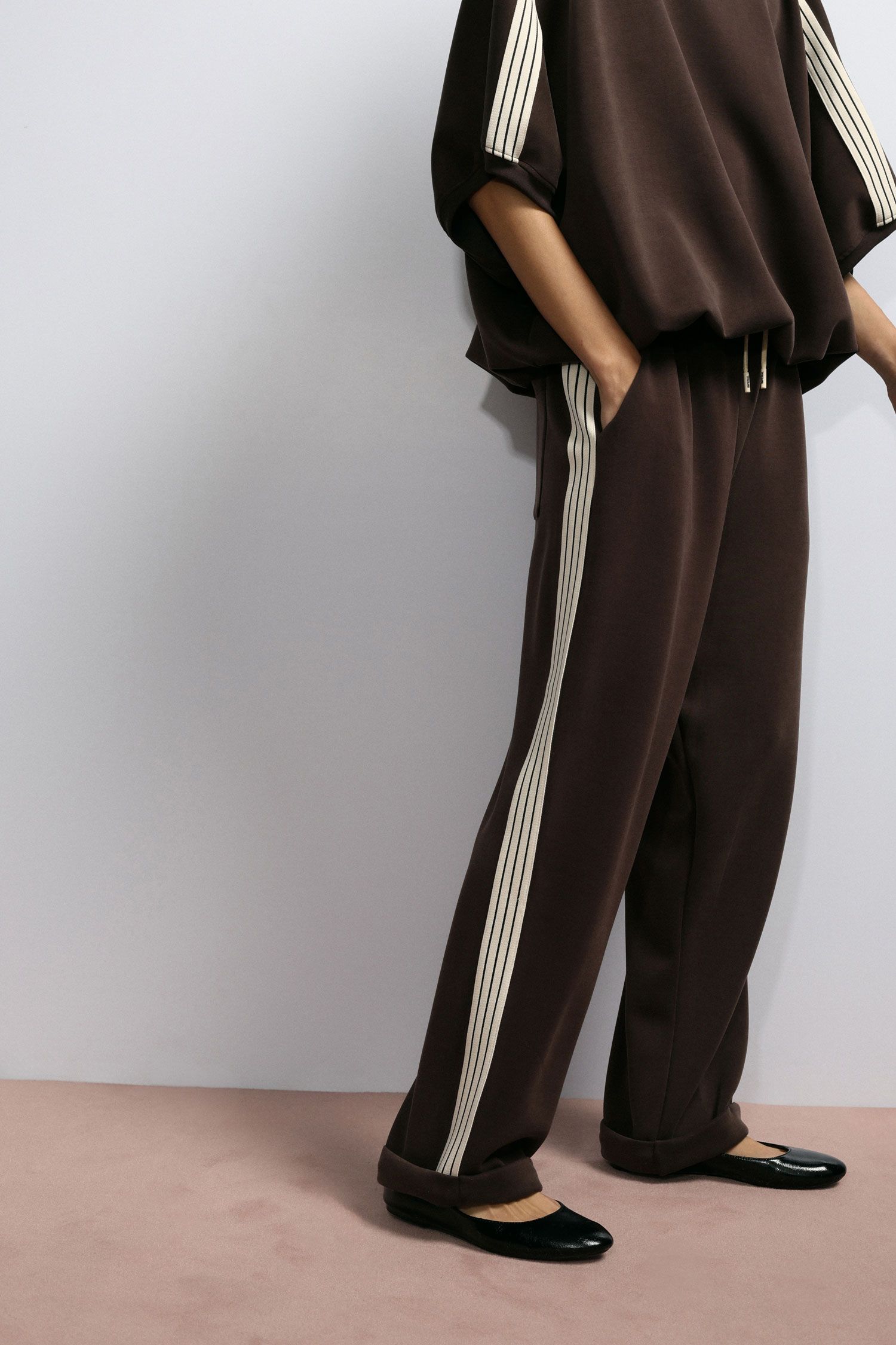 Tuta con dettagli a righe Imperial